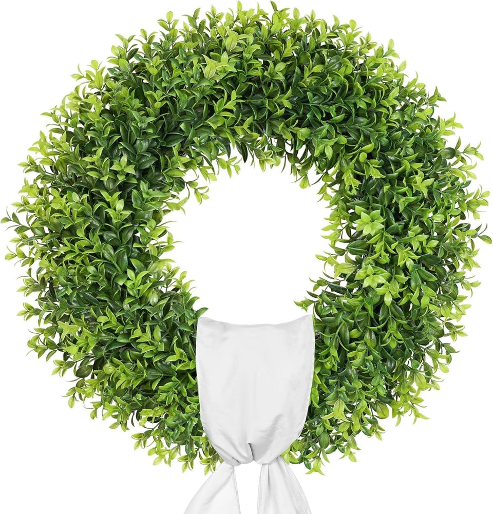 Petalyn 24-inch boxwood wreath with sash for an elegant front-door display