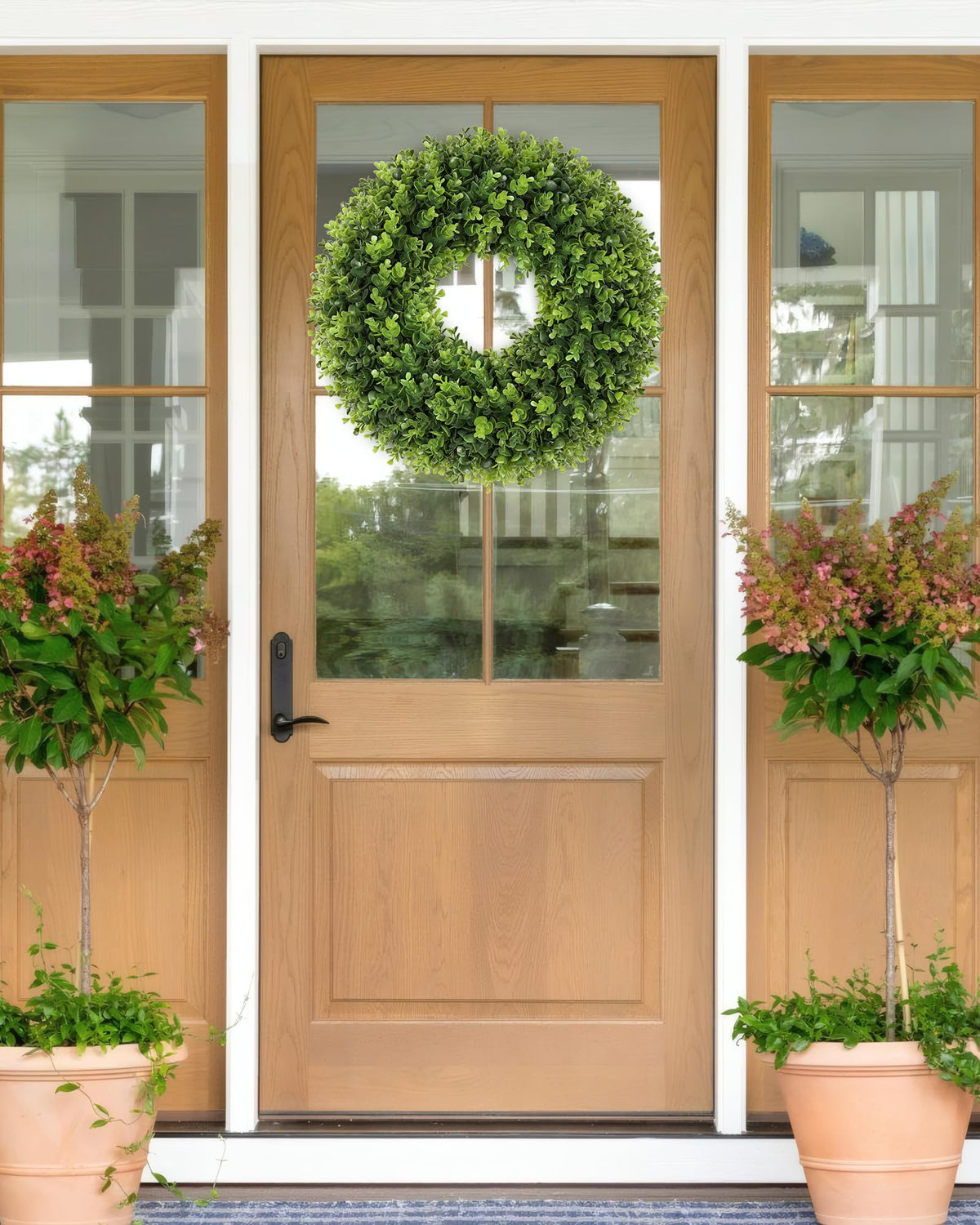 Close-up of Petalyn boxwood wreath showing handmade grapevine base