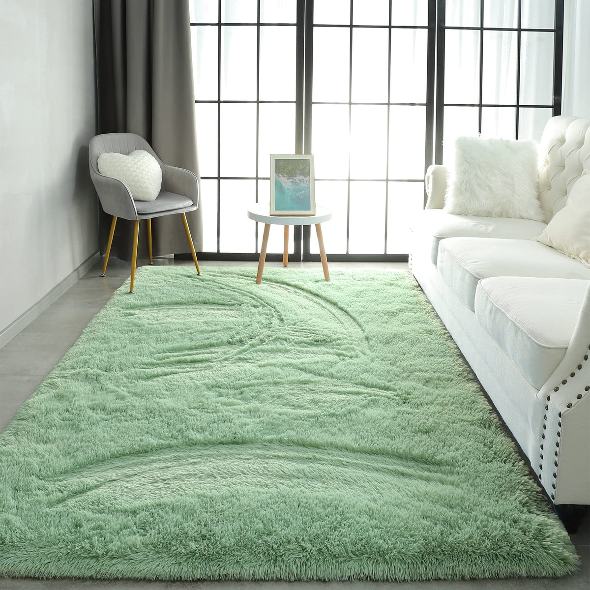 Pettop fluffy sage green area rug easy to clean and maintain.