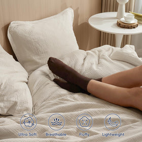 PHF all-season comforter on bed showcases versatile, spa-like neutral tone
