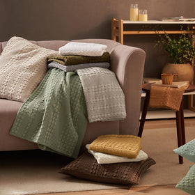 PHF bed setup with pillow sham showcases decorative yet practical styling.