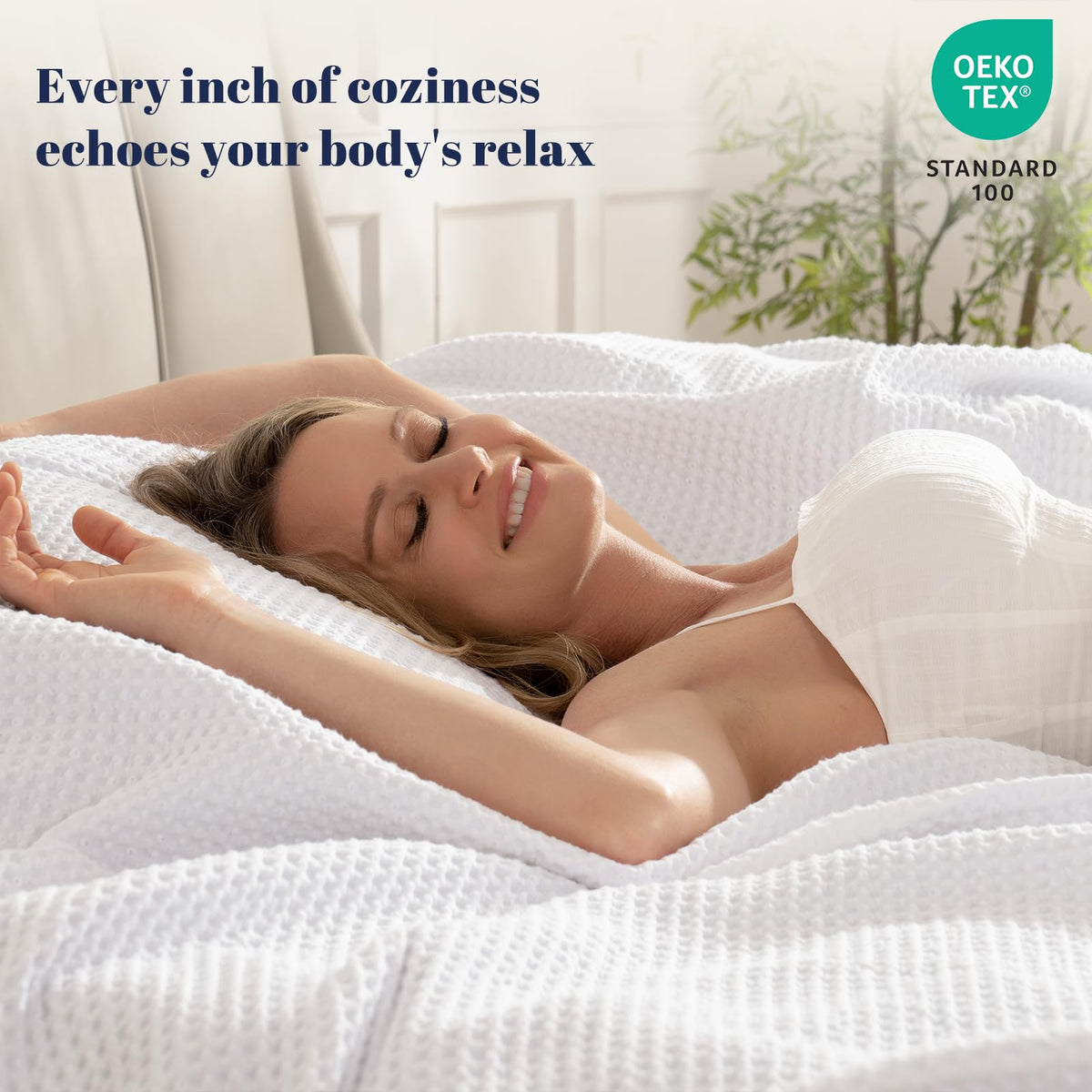PHF blanket on bed white enhances a calm, clean bedroom.