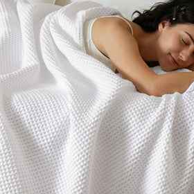 PHF waffle blanket flat lay shows texture and softness for cozy home decor.