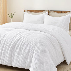 PHF Ultra Soft Waffle Weave Comforter Set on bed creates cozy bedroom ambiance.