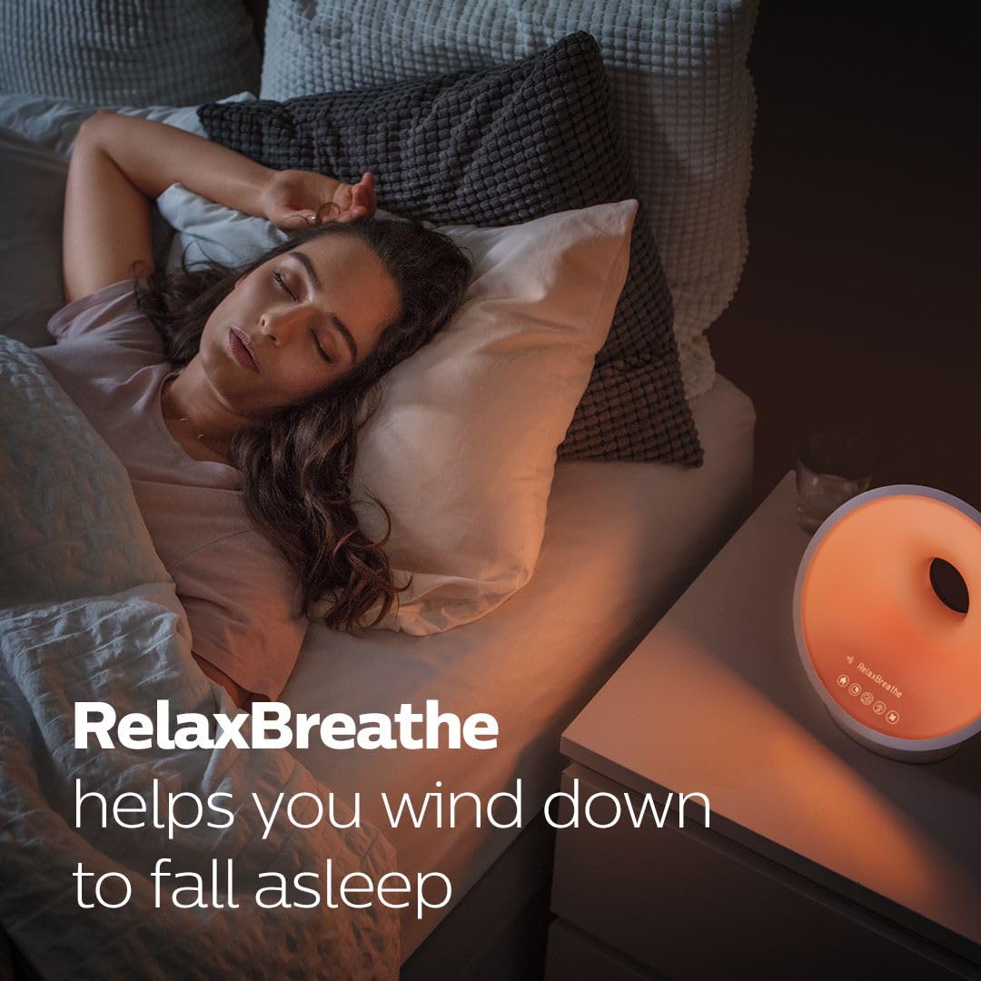 Philips SmartSleep auto-dimming display reduces glare for a calmer bedroom.