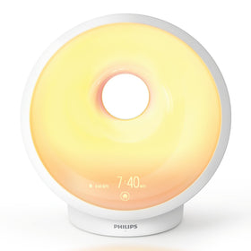 Philips SmartSleep bedside lamp blends ambiance with practical lighting.