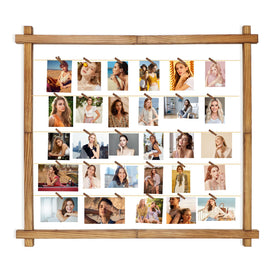PHOENANCEE collage frame with clips displaying favorite photos on a sleek wall.