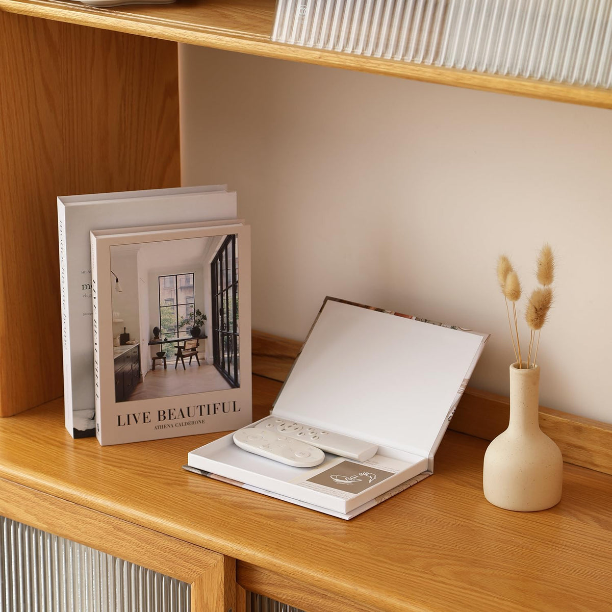 Picapspr living room or office decor accent on shelf.