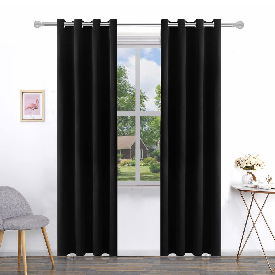 Pickluc grommet blackout curtain in black blocks light for a darker living space.