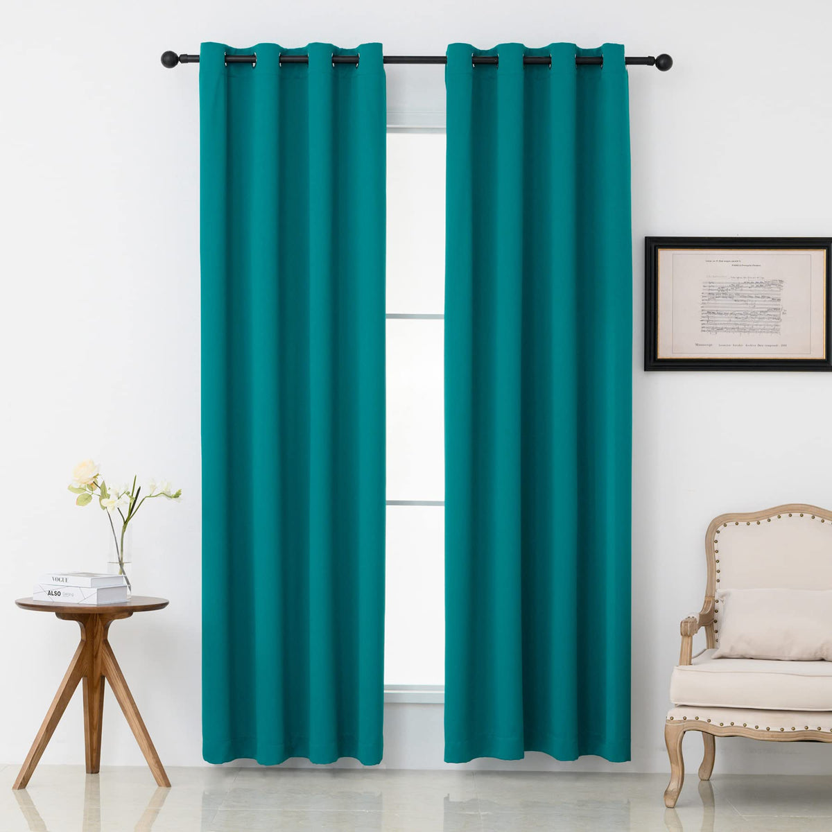 Pickluc teal blackout curtains with grommets, 52W x 84L, for smooth light blocking.