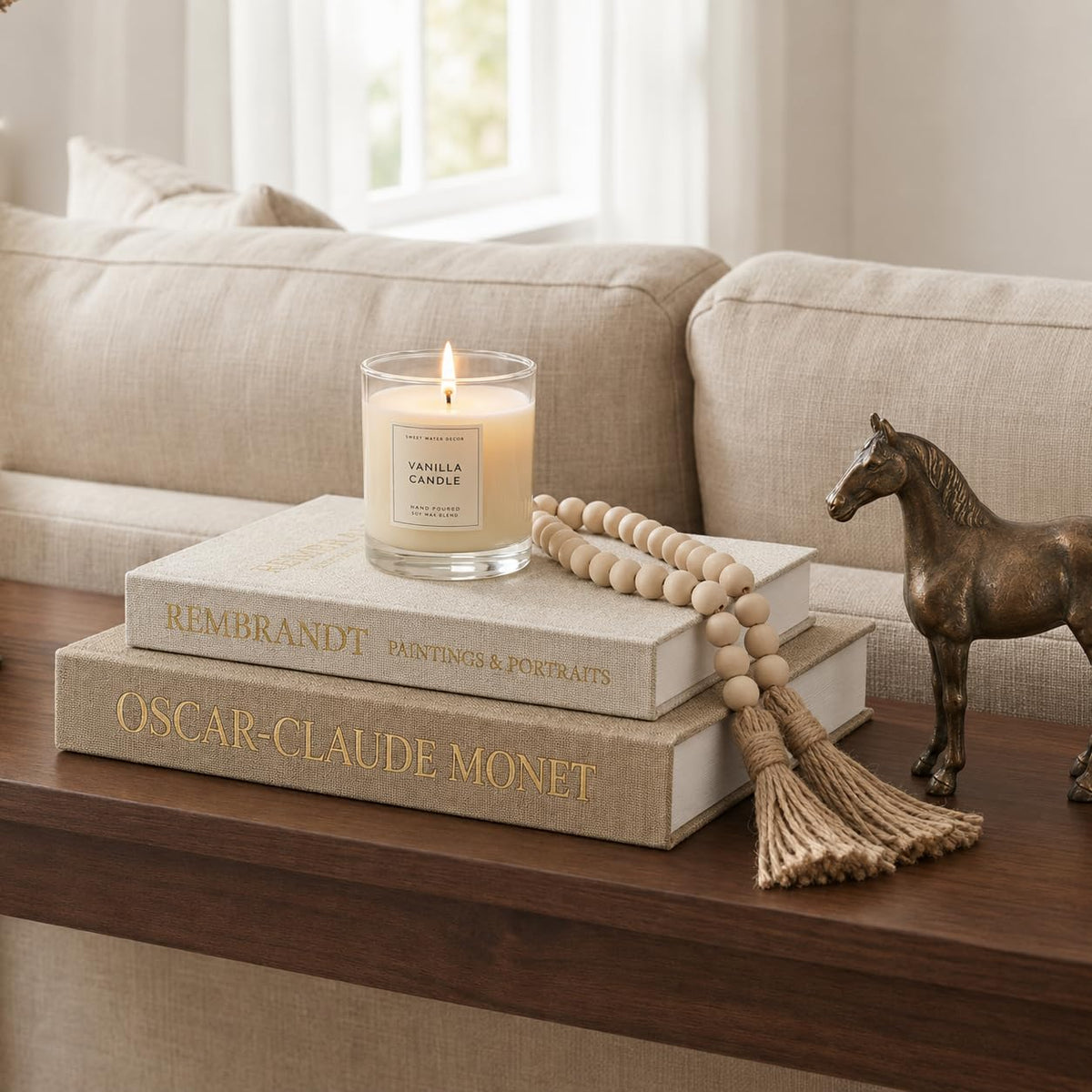 Picsurs decorative books stackable faux-book boxes add elegant storage on display shelves for organized living rooms.