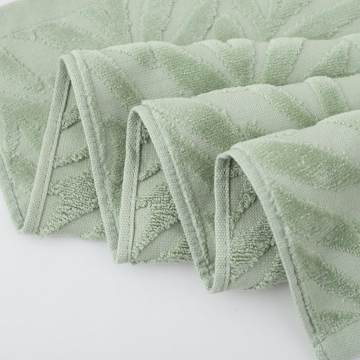 Pidada giftable green towels set makes a thoughtful housewarming gift.