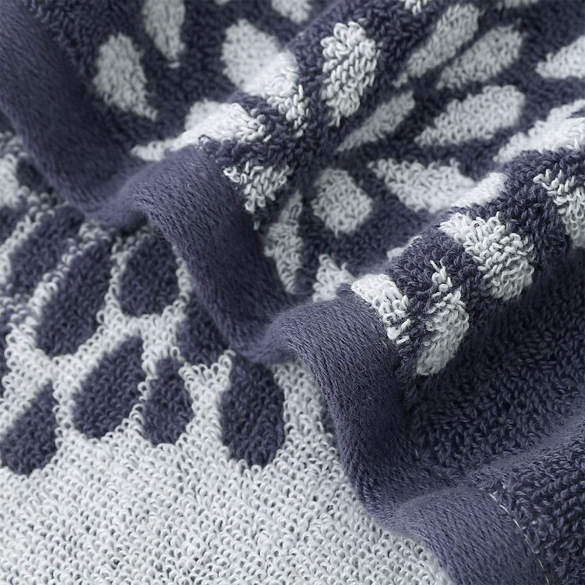 Pidada hydrangea pattern towel set shown in light grey and denim blue colors