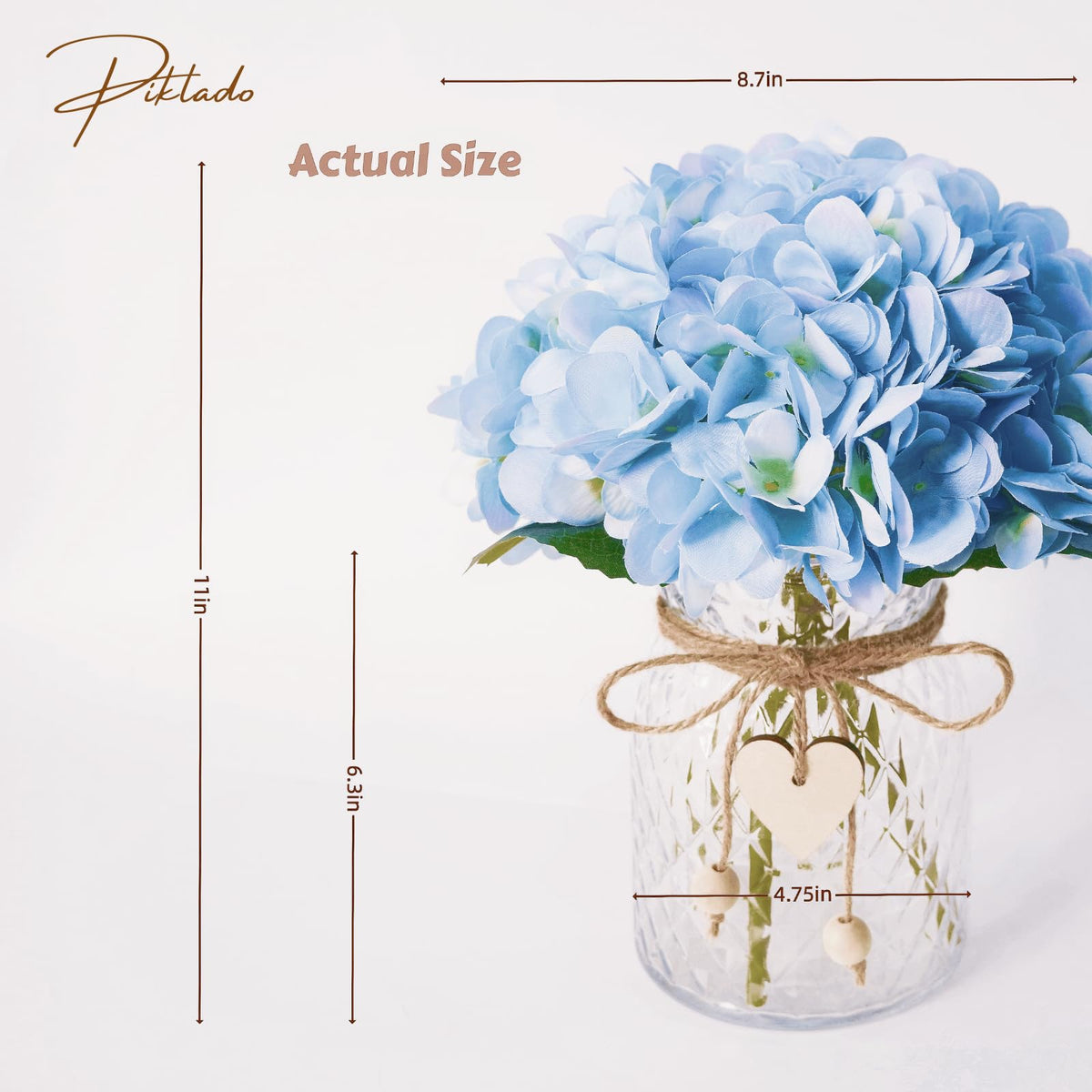 Piklado glass vase with heart plaque adds Bohemian charm to spaces.