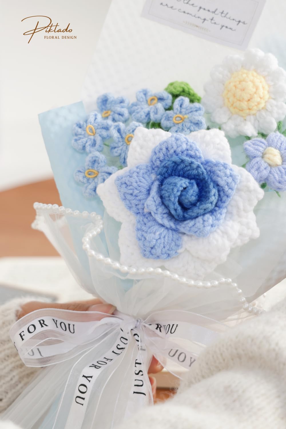 Piklado blue crochet bouquet for wedding or event decor.