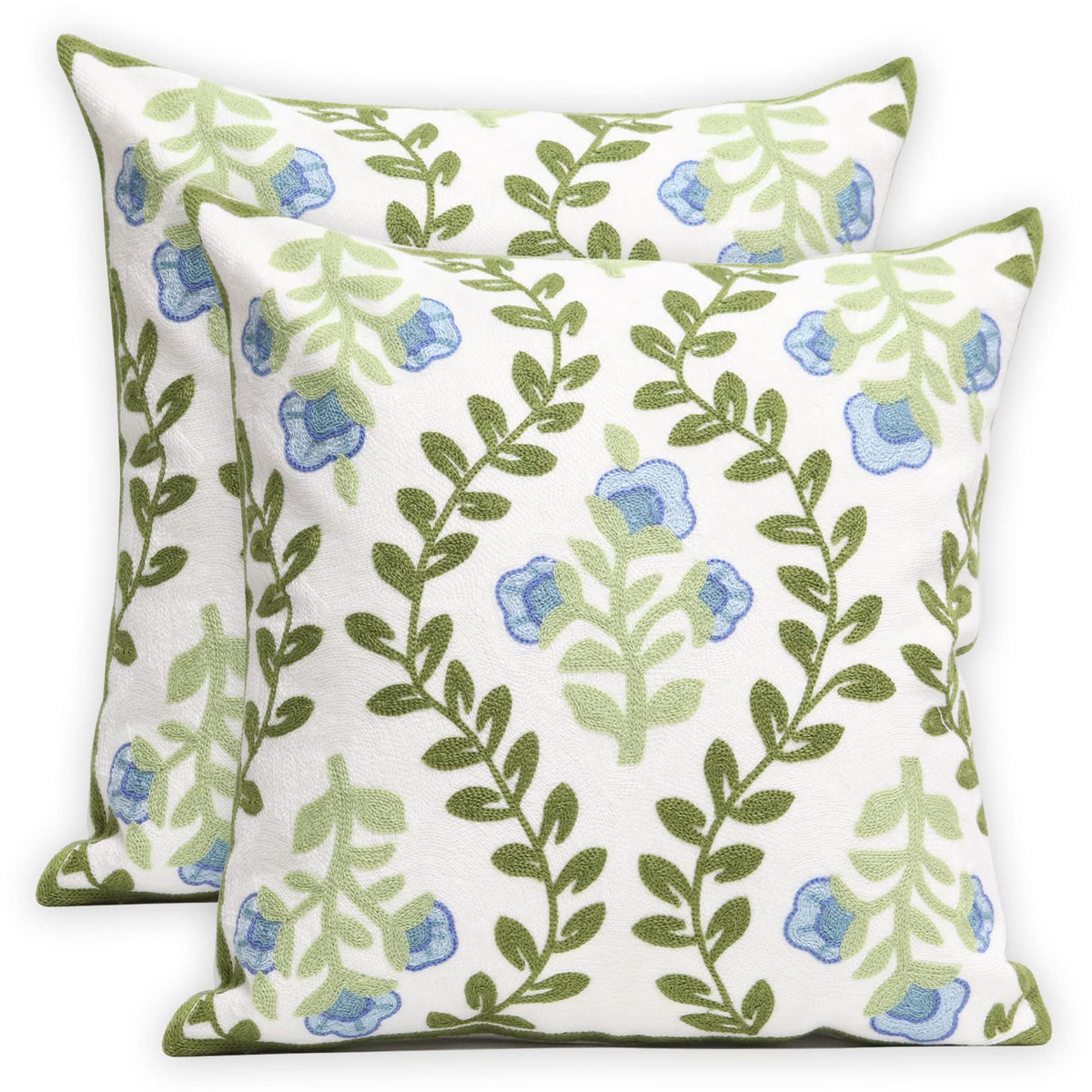 Pilmandu embroidered pillow cover with blue floral design elevates living room decor.
