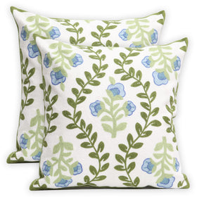 Pilmandu embroidered pillow cover with blue floral design elevates living room decor.