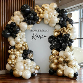 Pinbra Black White Gold balloon arch double stuffed for a luxurious event backdrop.
