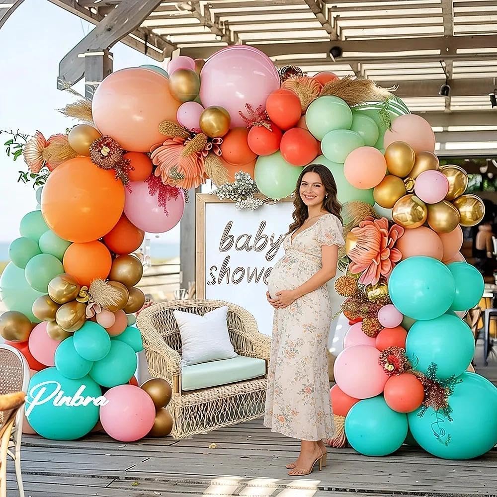Pinbra metallic gold balloons bring festive shimmer to photos.
