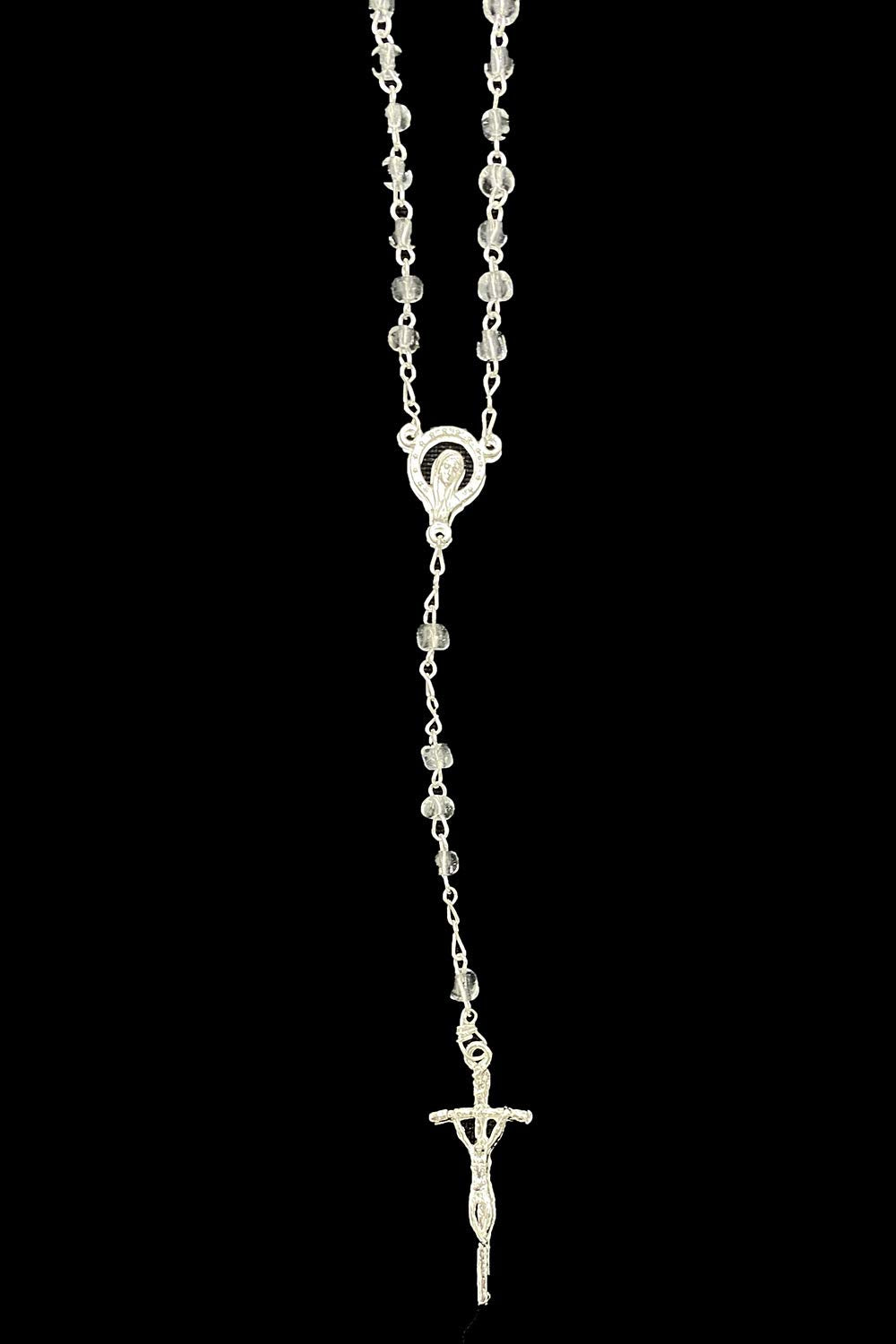 Pink Princess baptism rosary matches the set with a complementary finish.
