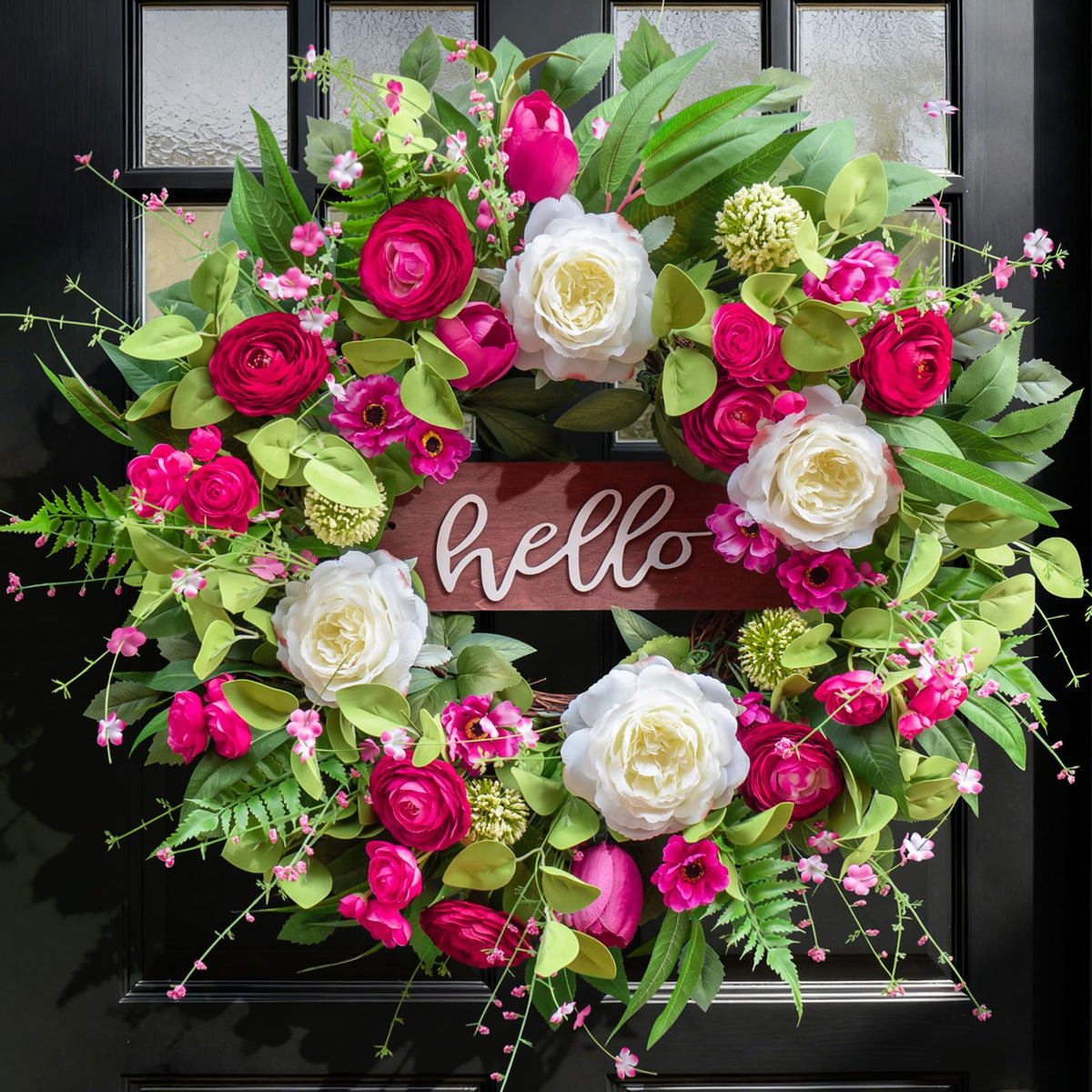 Pinkpuii Spring Wreath with Hello sign welcomes guests at the front door