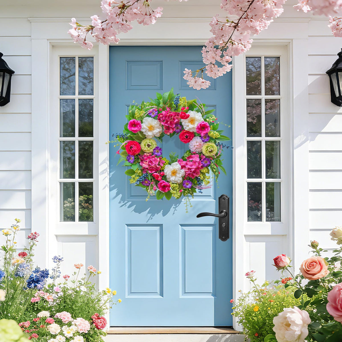 Pinkpuii spring wreath features white blooms and blue berries for vibrant seasonal appeal.