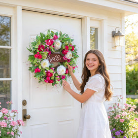Pinkpuii wreath featuring pink peonies and tulips for a bright entry