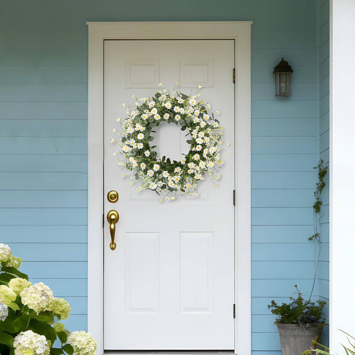 Pinkpum daisy and eucalyptus wreath for welcoming entryways.