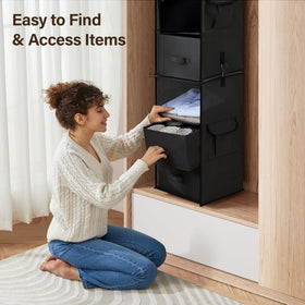 Pipishell closet organizer holding shirts and towels to save floor space