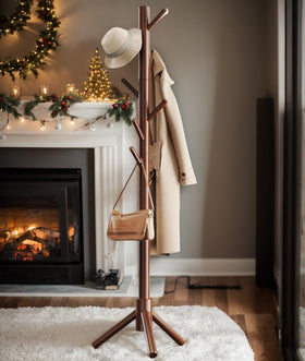 Pipishell sturdy wood coat tree helps maintain tidy spaces
