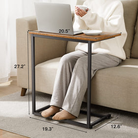 Pipishell cozy living-room side table supports drinks and laptop use.