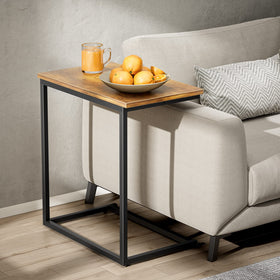 Pipishell under-sofa side table slides under the couch for quick access.