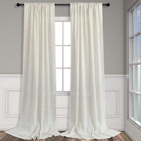 Two-panel set measures 52 by 108 inches per panel for large windows.