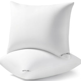 Piwaal luxury hotel pillows side view shows supportive loft for neck alignment.