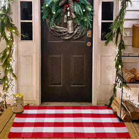 PIXFAIRY Christmas plaid rug at front door enhances curb appeal and festive welcome