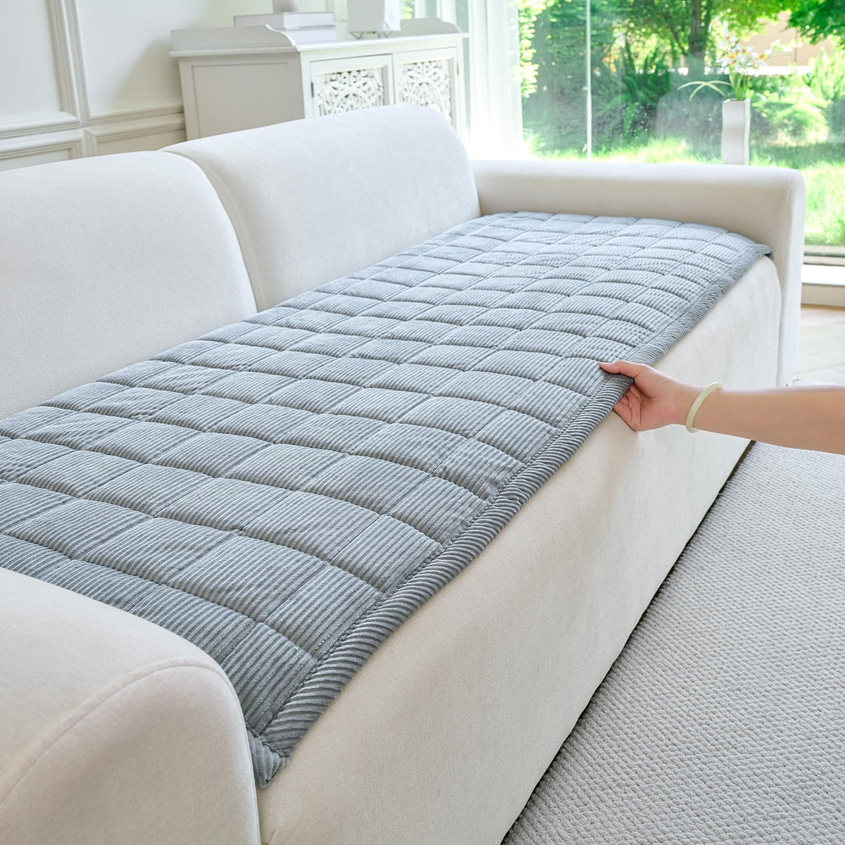 PJLZJFBY dog couch cover with non-slip backing protects furniture during play.