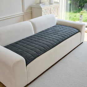PJLZJFBY couch cover showing non-slip backing to prevent shifting on surfaces.