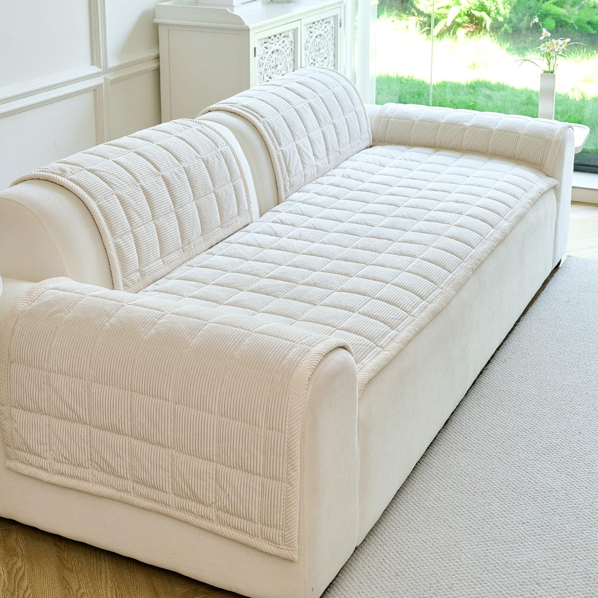 PJLZJFBY couch cover non-slip backing demonstrates stay-in-place performance on smooth surfaces.