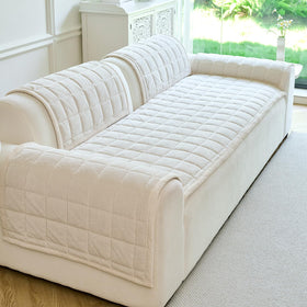 PJLZJFBY couch cover non-slip backing demonstrates stay-in-place performance on smooth surfaces.