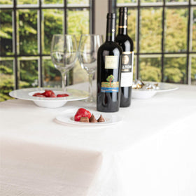 PLASTICPRO wedding dinner setup tablecloth adds clean, refined decor.