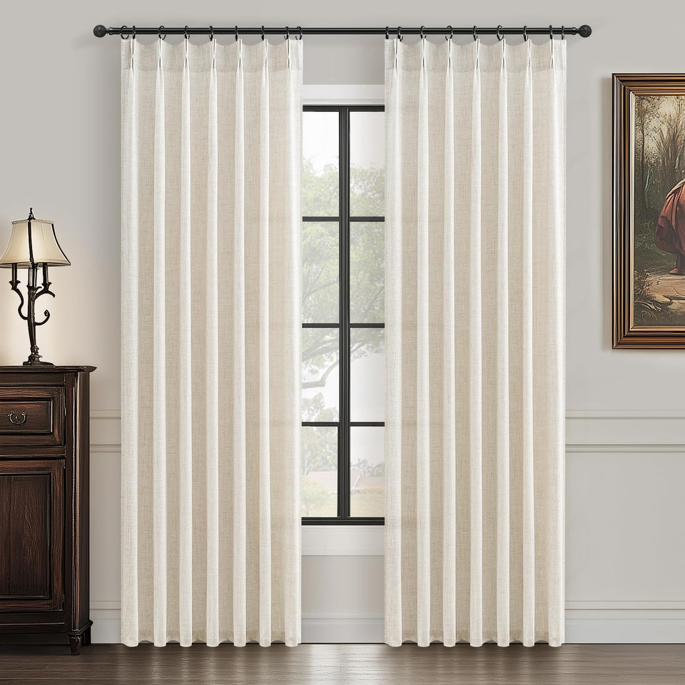 PleatedDrapes pinch-pleat curtains in cream provide texture and soft light diffusion for living rooms