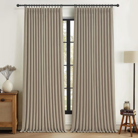 PleatedDrapes pinch-pleated linen curtains in taupe provide elegant room shading.