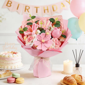 Plukers cream puffs and eucalyptus accents in bouquet