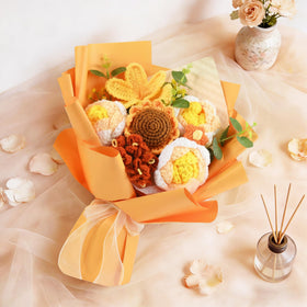 Plukers preserved forever knitted flowers in bag—gift-ready presentation