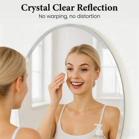 Pocetry 20x28 oval mirror with beveled edge catches light beautifully.