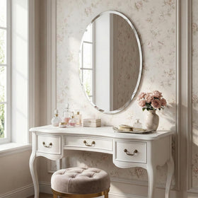 Pocetry frameless oval mirror flush mount creates seamless wall profile.