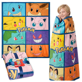 Pokémon soft fleece blanket on sofa provides cozy warmth for movie night.