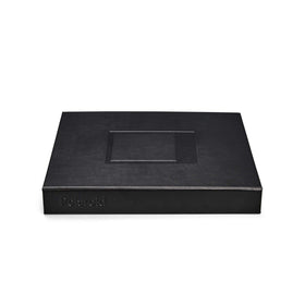 Polaroid Large Photo Album on side table, ready for display.