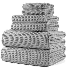 POLYTE 430gsm bath towel in 30x60 size for fast, plush drying.