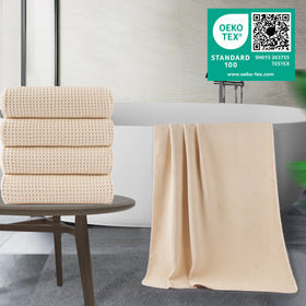 POLYTE quick-dry waffle towel demonstrating rapid absorption after shower.